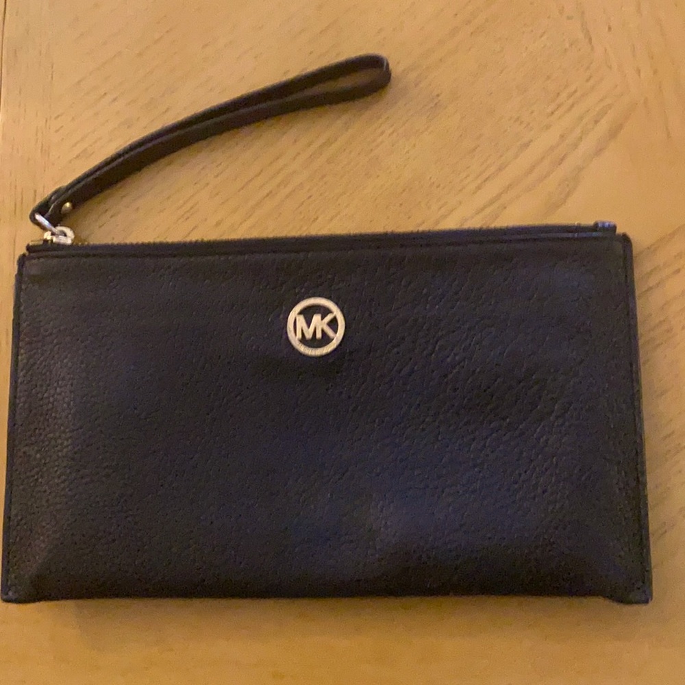 An MK ( Michael Kors) small bag!
